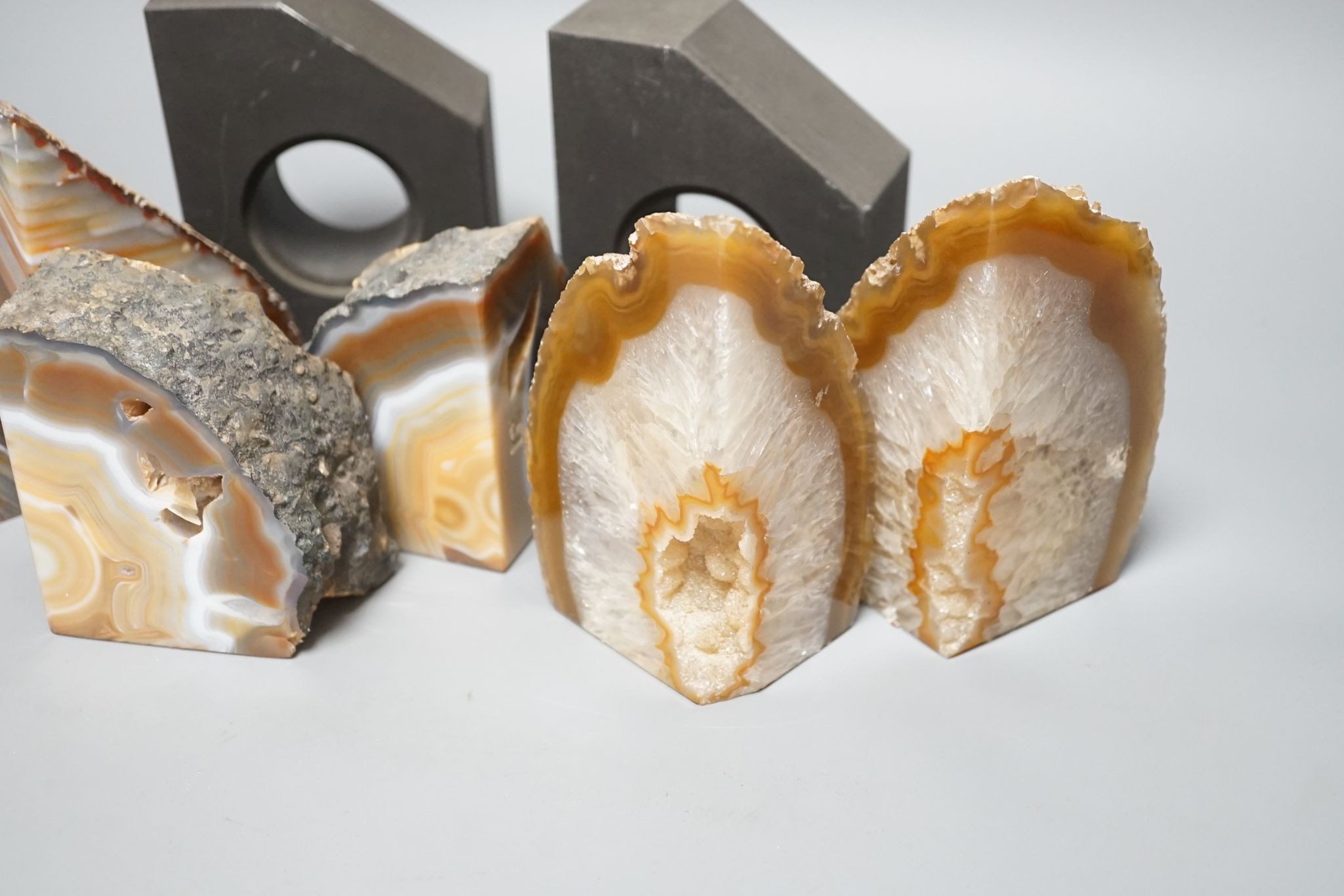 Three pairs of agate geode and a pair of slate bookends
